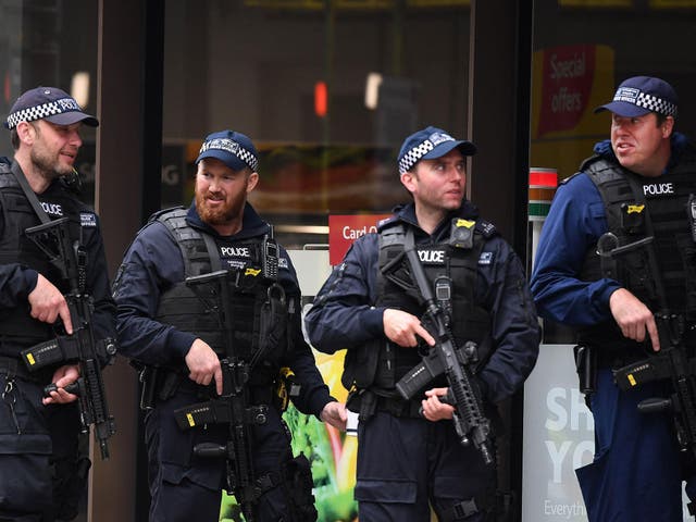 British armed police on duty near the site of an attack at Borough Market in London