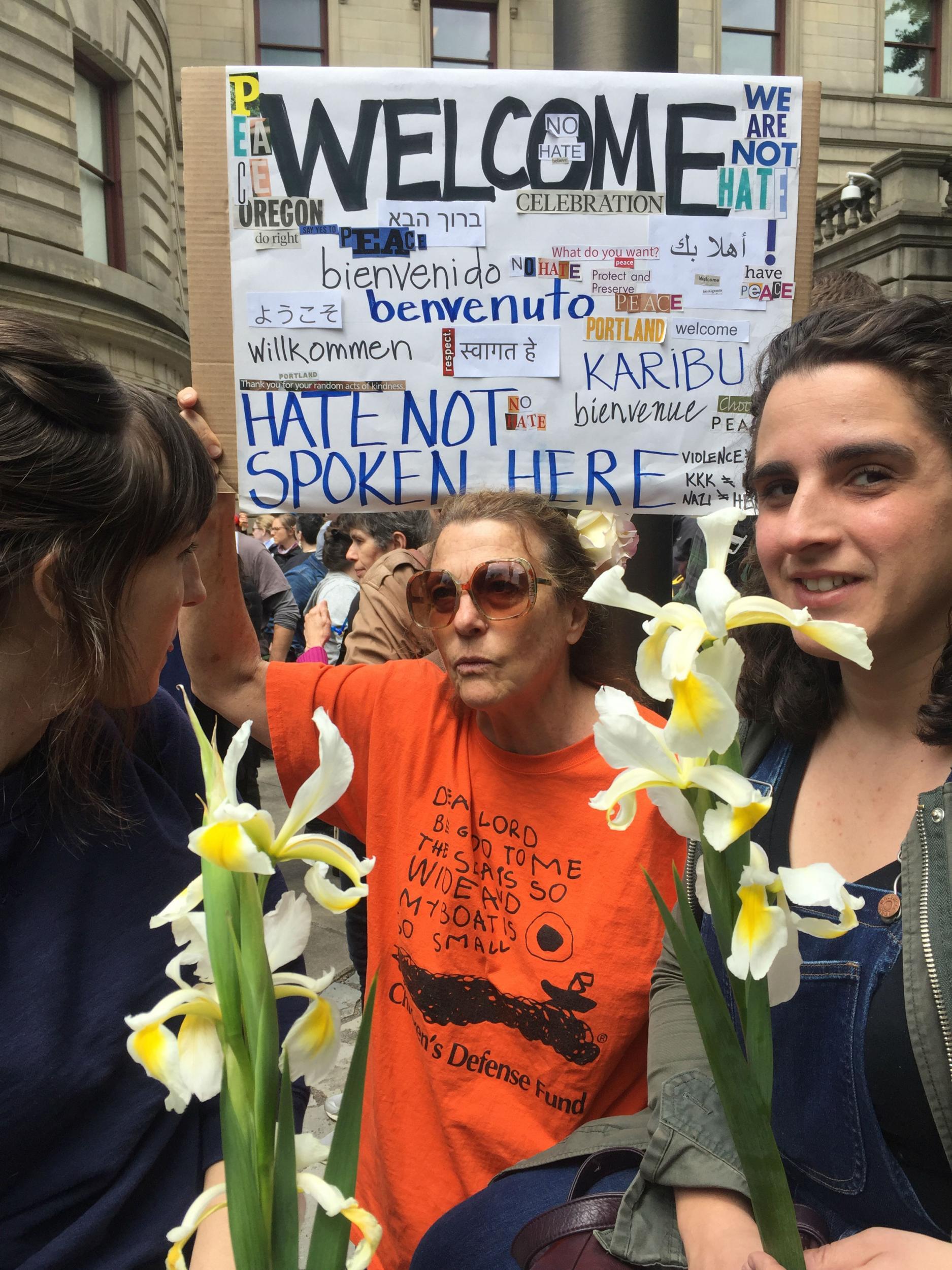 Counter-protestors trying to get their message across to alt-right rally-goers across the street in Portland