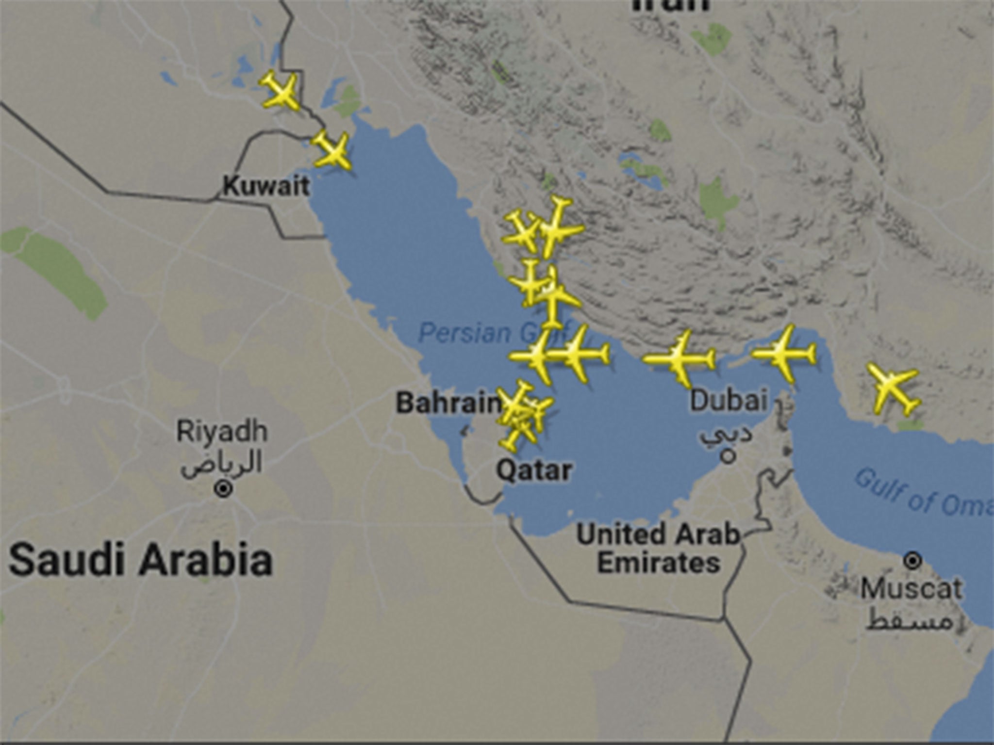 Live image of flights over the Persian Gulf shows Qatar Airways aircraft (yellow icons) avoiding Saudi and Emirati airspace