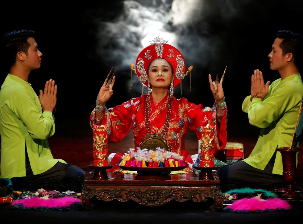 Summon going on: An Chinh, a medium, in a performance of Hau Dong at the Viet Theatre in Hanoi