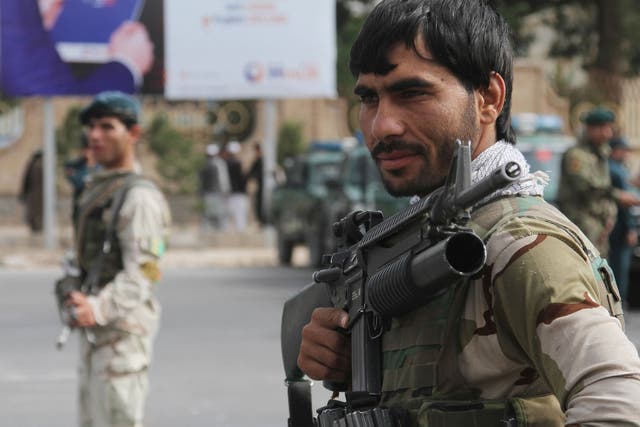 Afghan security forces keep guard after a wave of violence across the country 