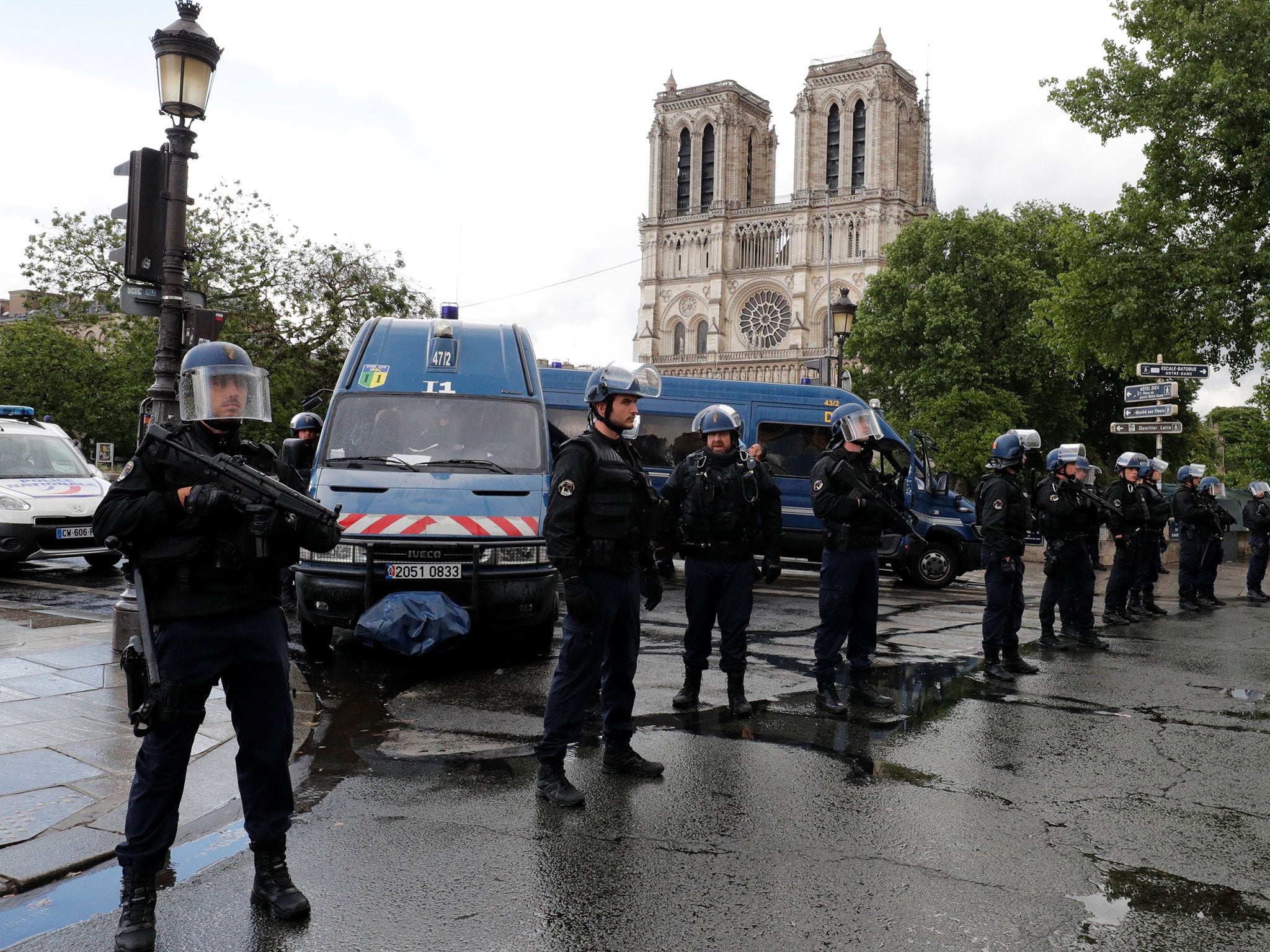 &#13;
French police stand at the scene of a shooting incident near the Notre Dame Cathedral in Paris, France on 6 June 2017 &#13;