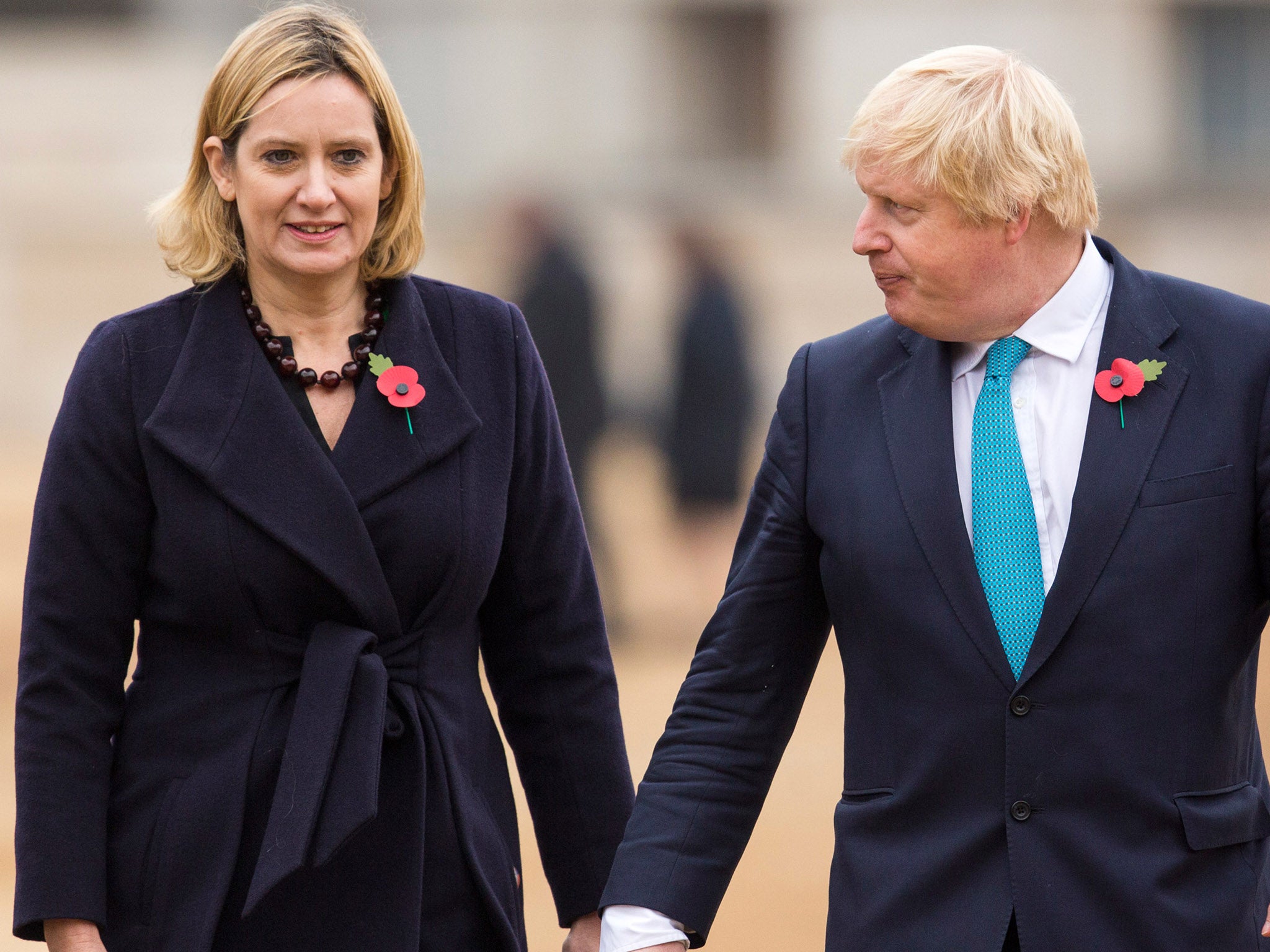 Home Secretary Amber Rudd and Foreign Secretary Boris Johnson leave the royal pavilion after attending the the Official Ceremonial Welcome for the Colombian State Visit at Horse Guards Parade