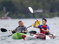 Trudeau paddles kayak around lake to speak to Canadians about climate 