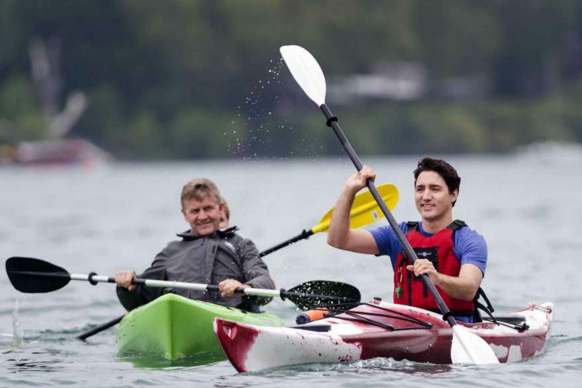 Justin Trudeau paddles kayak around lake to speak to Canadians about ...