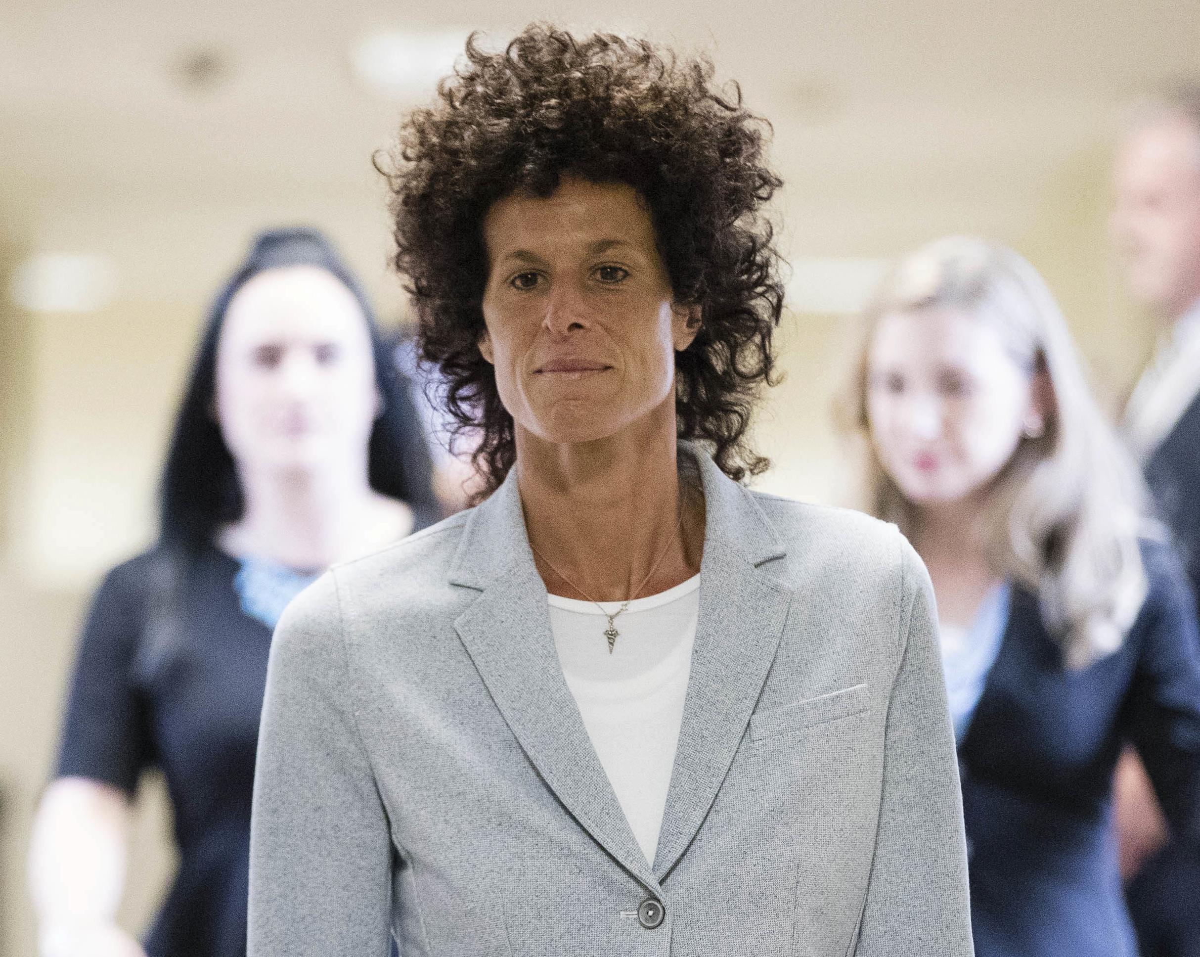 Andrea Constand walks to the courtroom during Bill Cosby's sexual assault trial at the Montgomery County Courthouse in Norristown, Pennsylvania