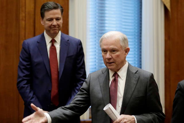 Former FBI Director James Comey with Attorney General Jeff Sessions at the Justice Department in Washington