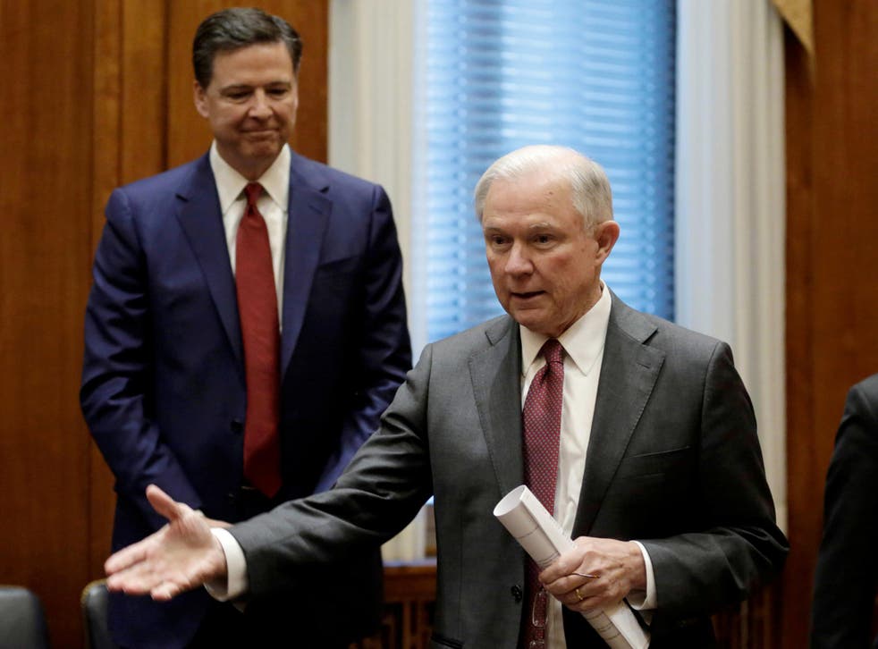 Former FBI Director James Comey with Attorney General Jeff Sessions at the Justice Department in Washington