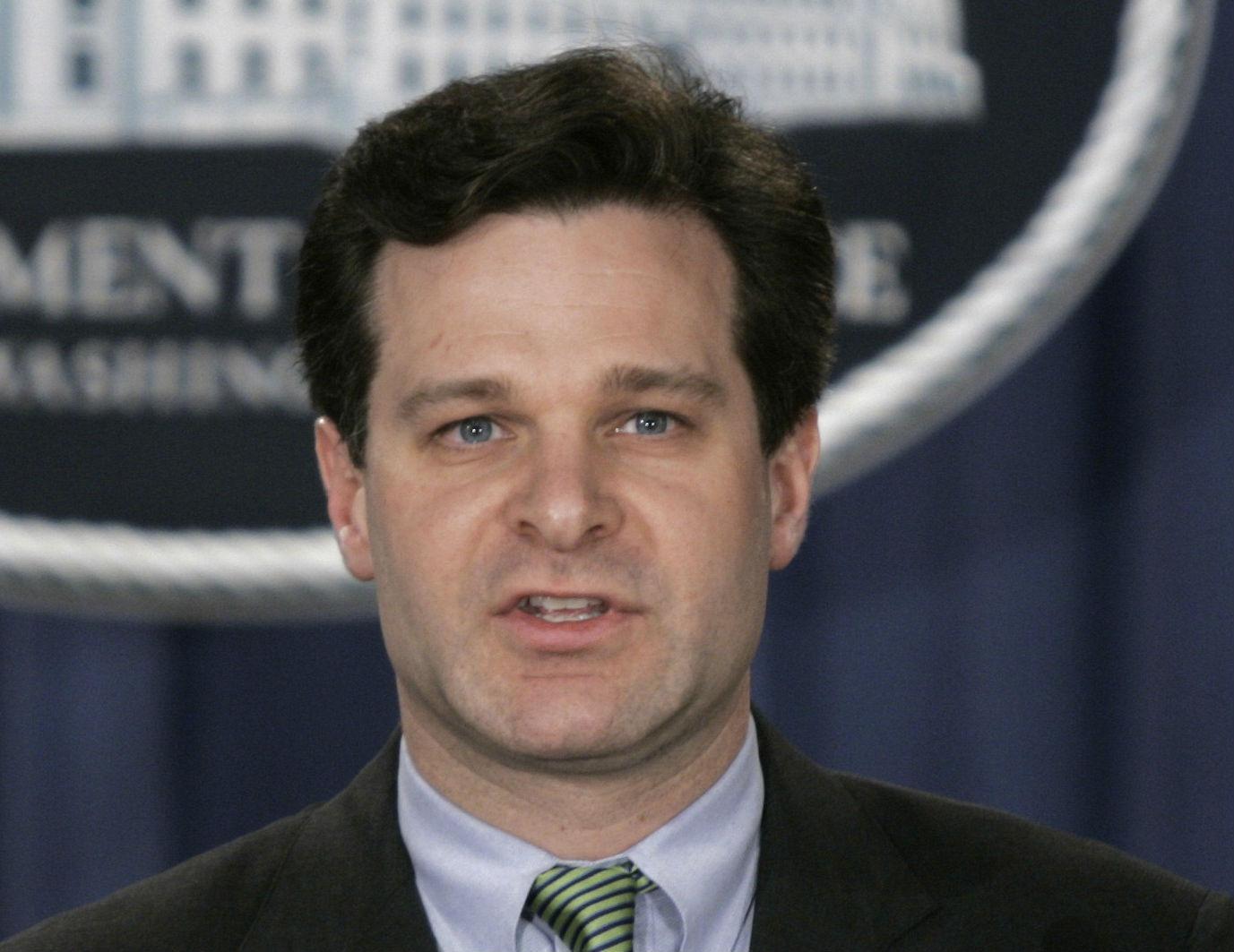 Mr Wray, pictured in 2005, has been a partner at the King & Spalding law firm since he left the Justice Department that same year