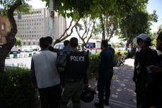 Iran parliament gunman 'detonates suicide vest on fourth floor'
