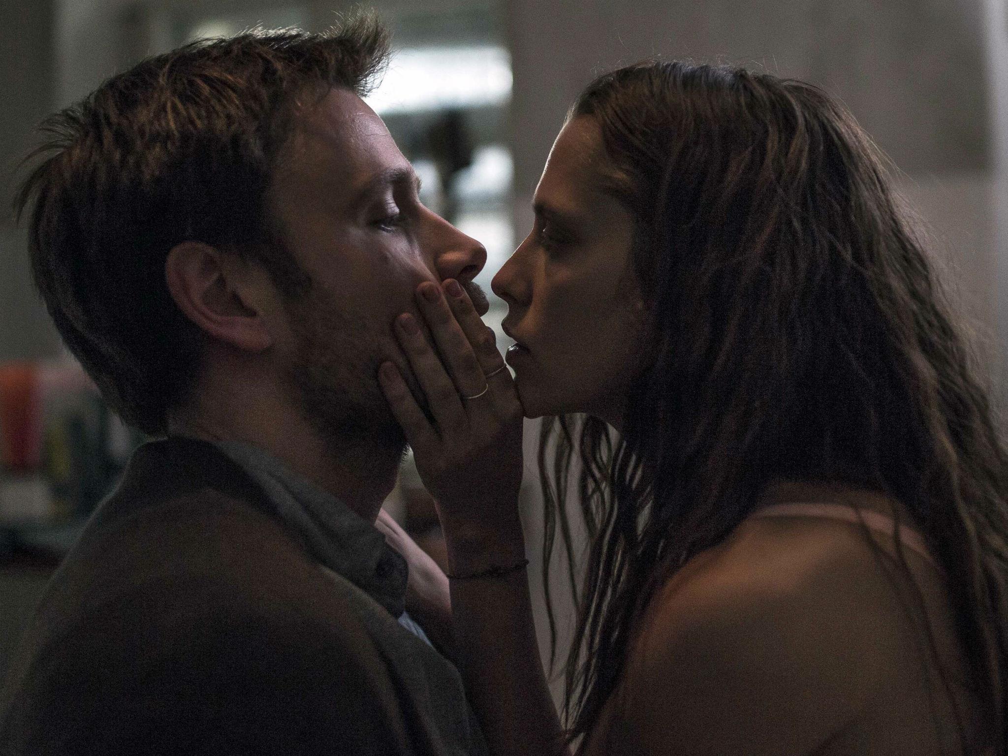 Palmer as Clare and Max Riemelt as Aldi, who holds her captive after a one-night stand