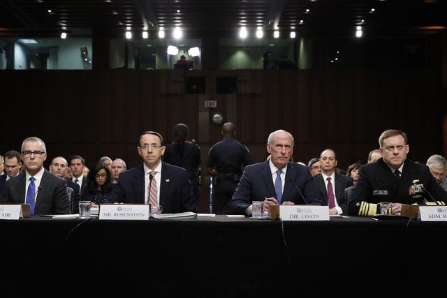 FBI acting director Andrew McCabe, Deputy Attorney General Rod Rosenstein, National Intelligence Director Dan Coats, and National Security Agency director Adm. Mike Rogers