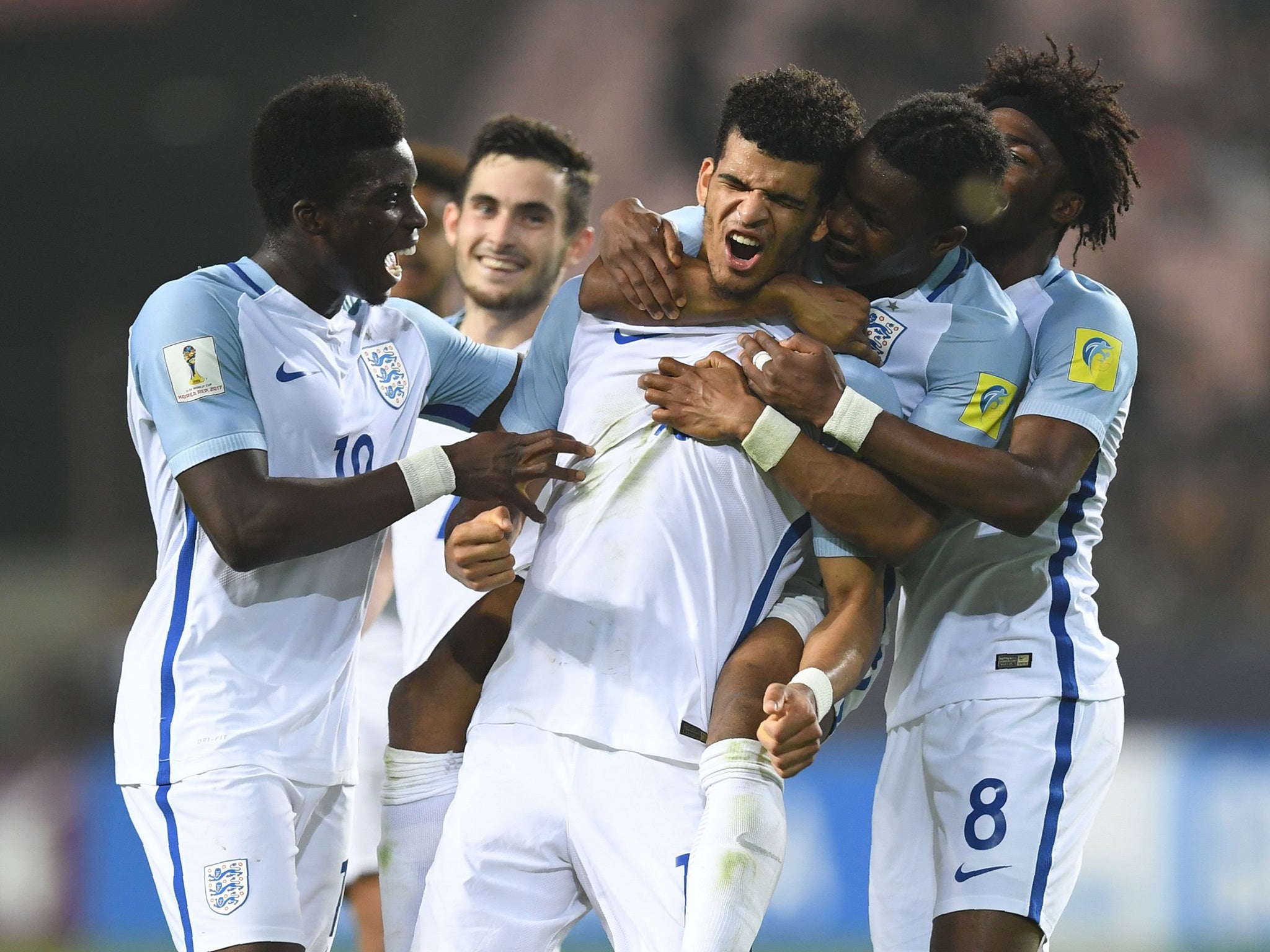 Dominic Solanke scored twice, either side of an Ademola Lookman goal, to seal England's place