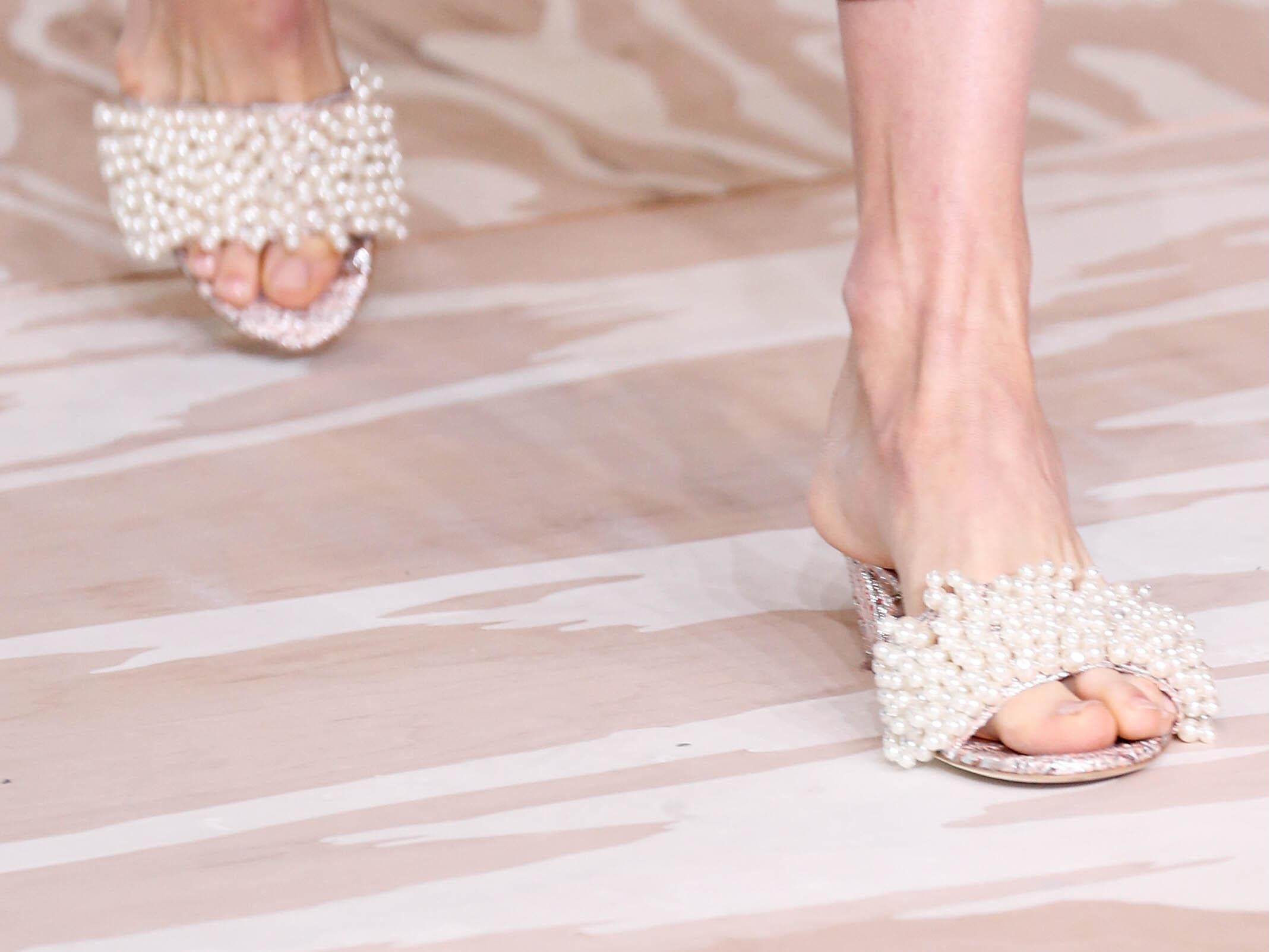 Tory Burch’s slides came covered in clusters of girlish pearls
