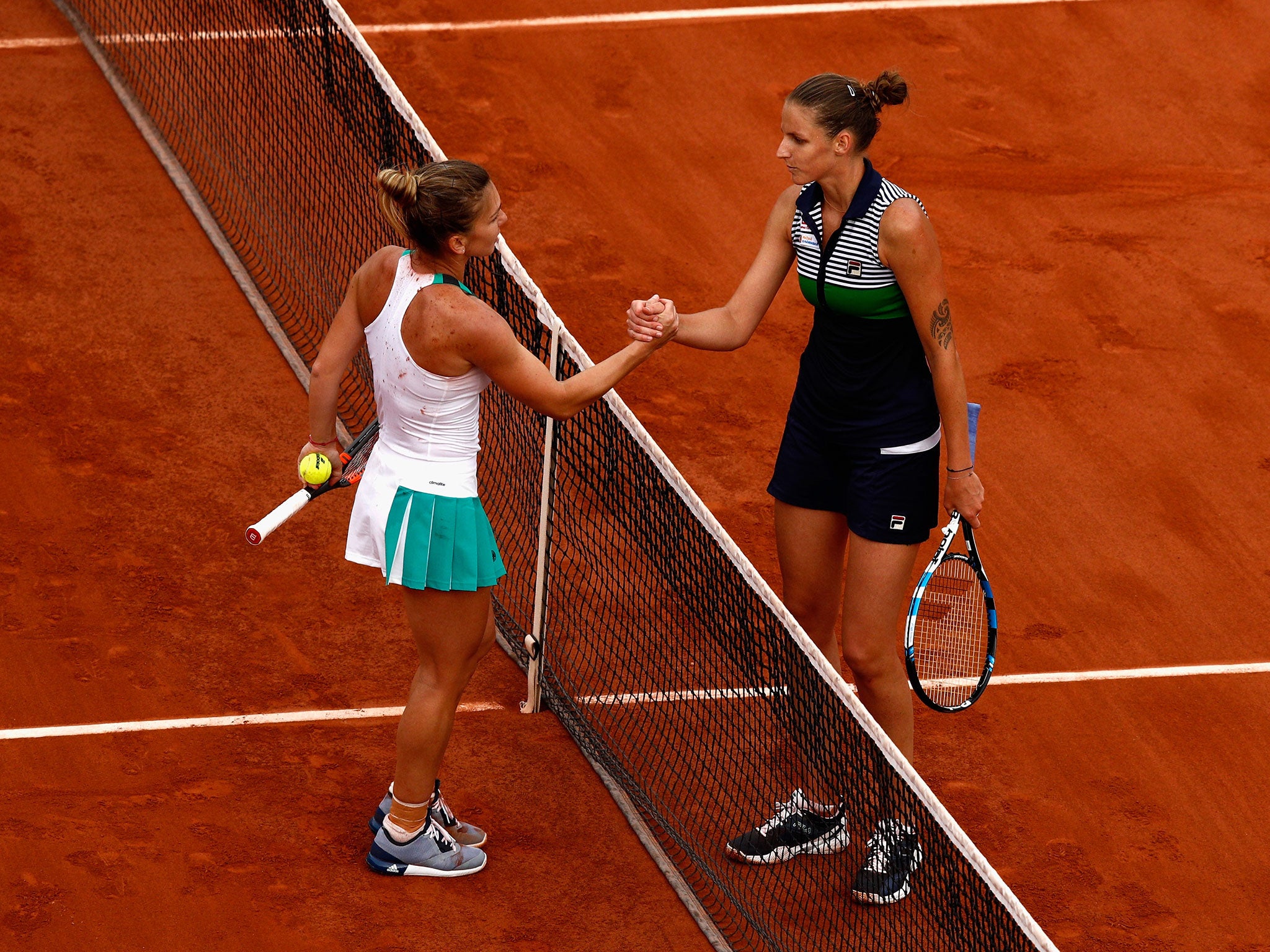 Halep and Pliskova shake hands after their semi-final clash