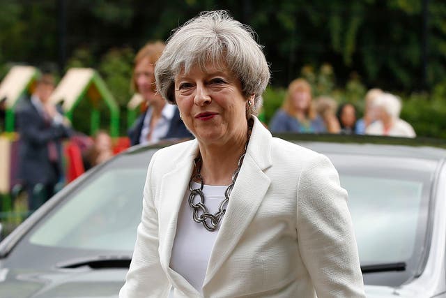Britain's Prime Minister Theresa May arrives to vote in the general election at polling station in Maidenhead, England