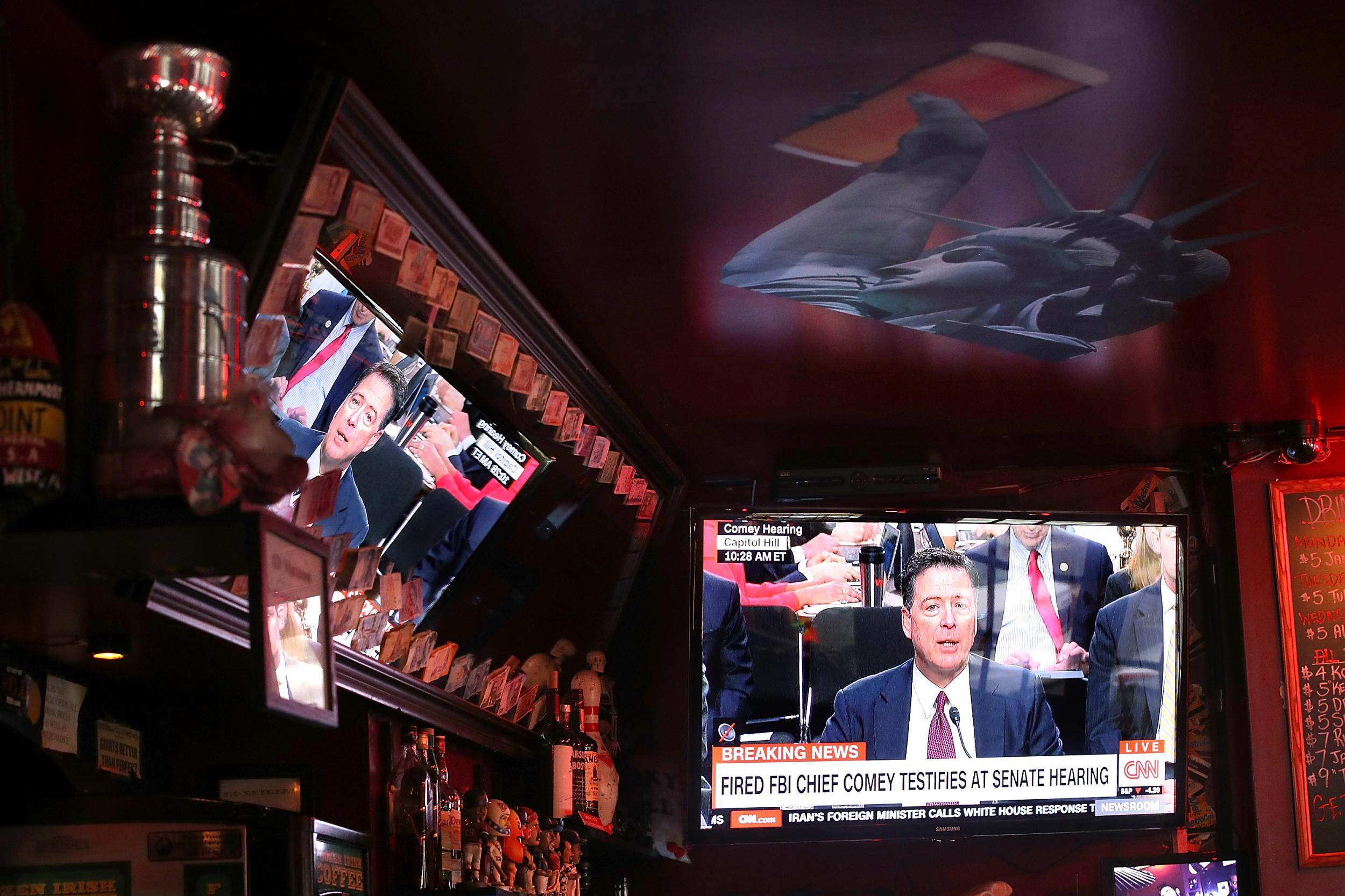 A watch party in San Francisco plays the Comey testimony