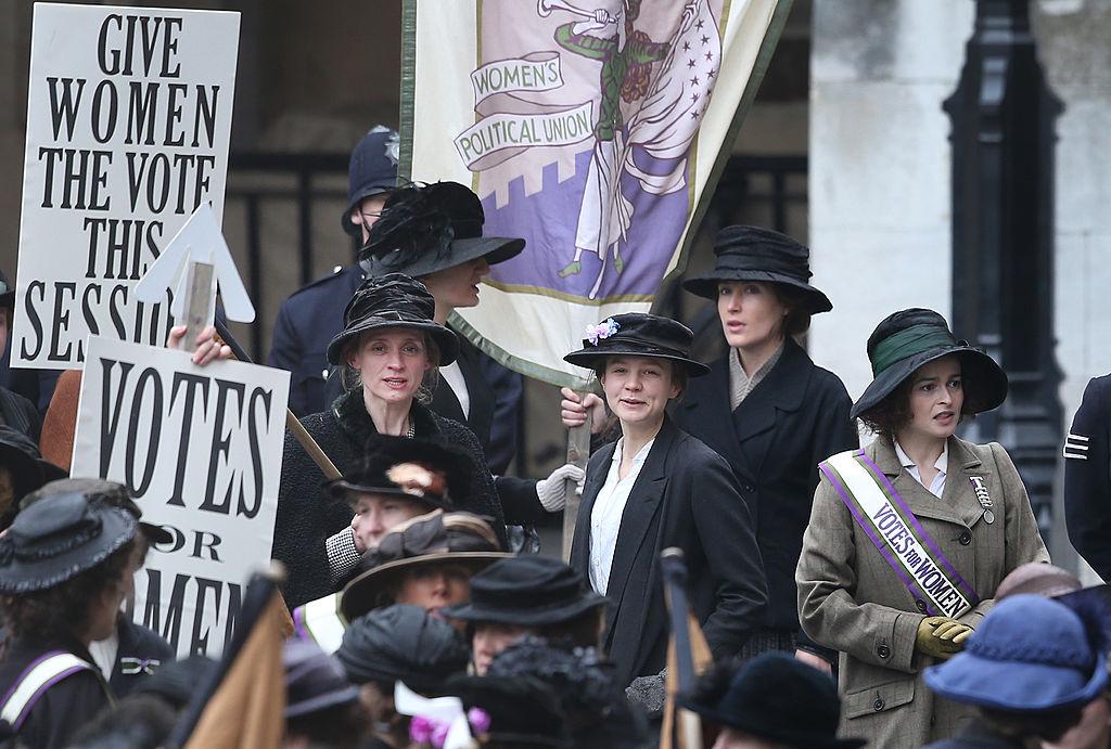 Anne-Marie Duff, Carey Mulligan and Helena Bonham Carter filming the movie Suffragette