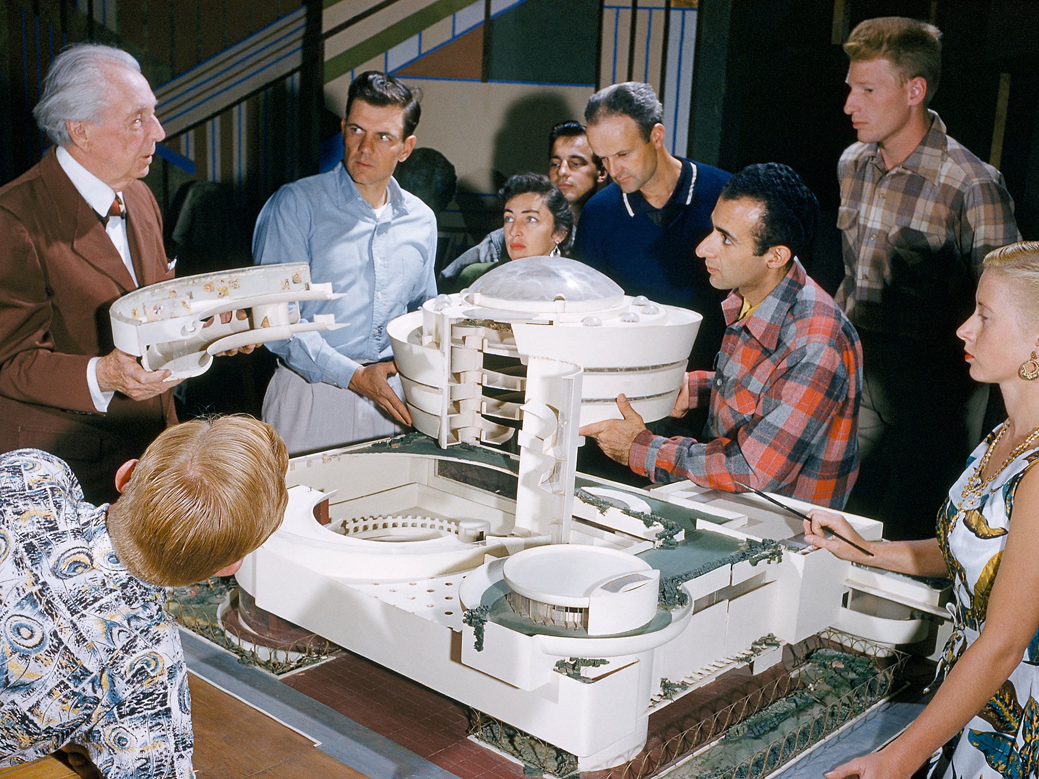Frank Lloyd Wright and his students with a model of the Guggenheim Museum in Taliesin, Spring Green, Wisconsin (Getty)