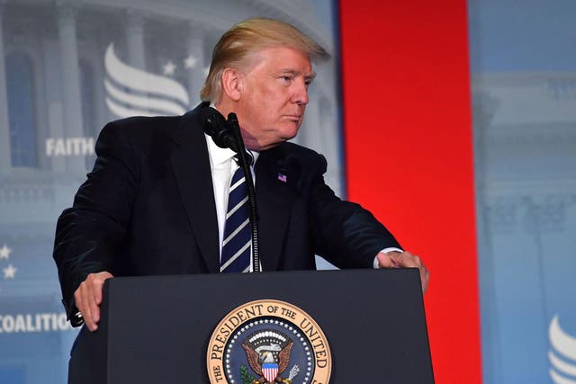 US President Donald Trump addresses supporters at a Faith and Freedom Coalition event