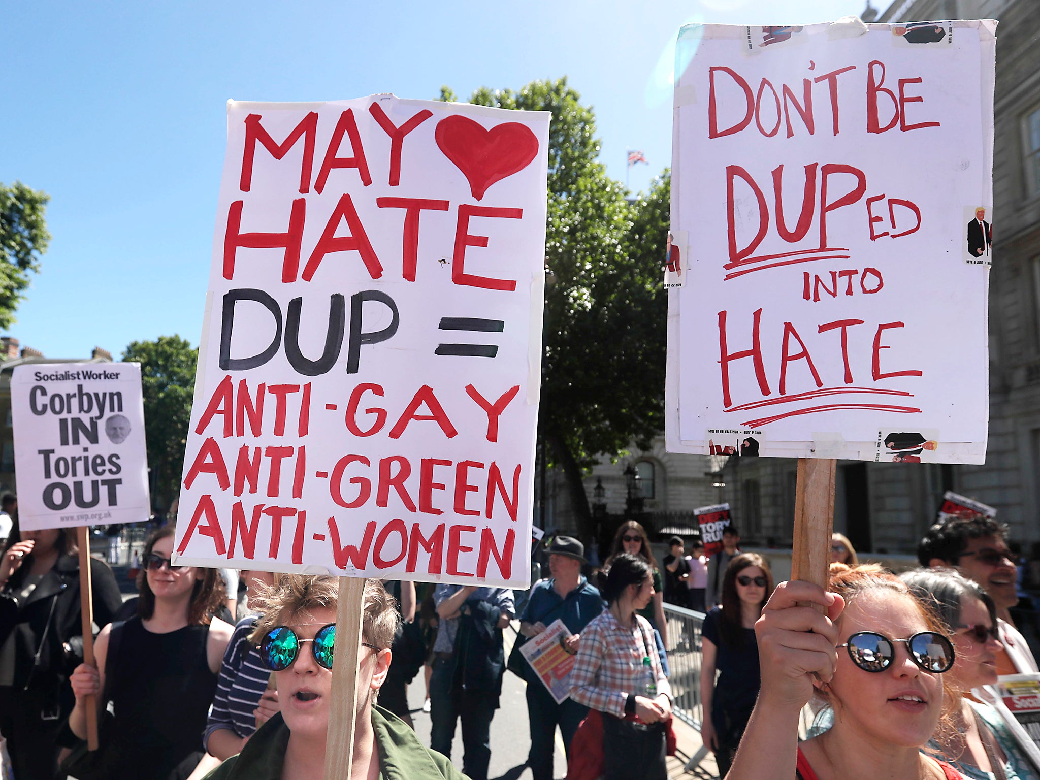 People in London are demonstrating against an agreement with the DUP