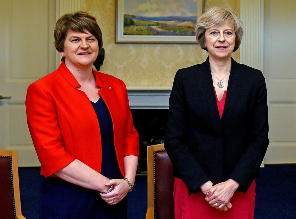 Theresa May with the DUP leader Arlene Foster: Talks are 'ongoing'