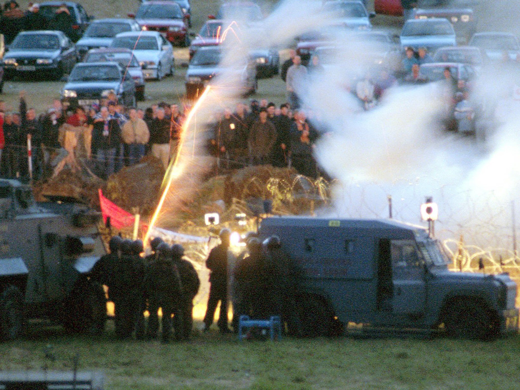 Security forces and Protestant demonstrators clash in the summer of 1998 in Drumcree, south-west of Belfast, during the marching season
