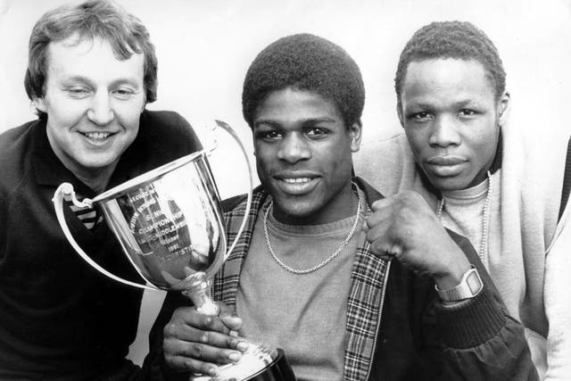 Christie with his trainers and the ABA light-middleweight trophy, in 1981