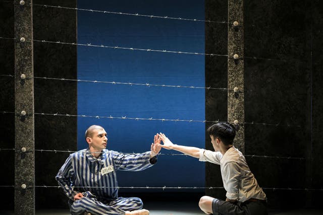Matthew Koon as Bruno and Filippo Di Vilio as Shmuel in 'The Boy in the Striped Pyjamas' at Richmond Theatre