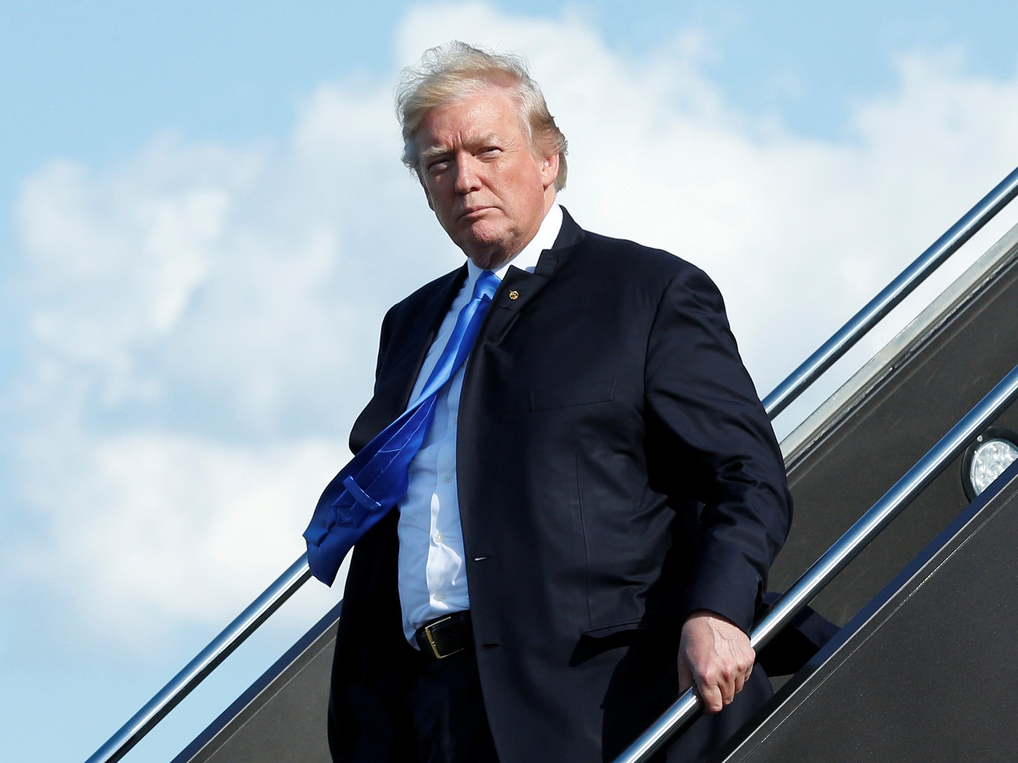 President Donald Trump arrives at Newark International airport in New Jersey, to spend a weekend at Trump National Golf Club in Bedminster
