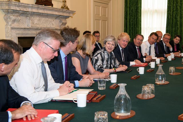 Theresa May hosts the first cabinet meeting of her new team on Monday