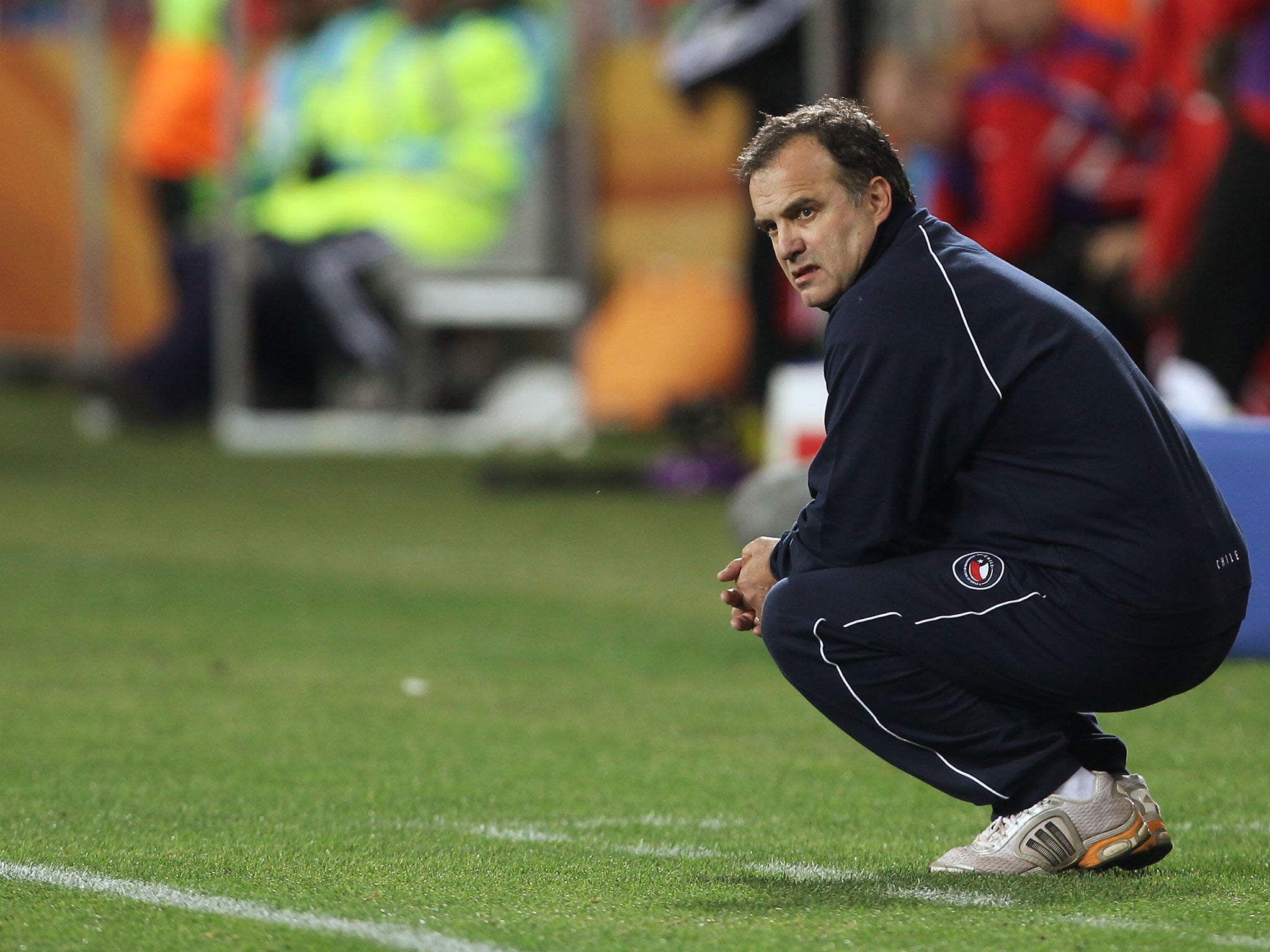 Bielsa watches on during Chile's Group H match against Switzerland at the 2010 World Cup