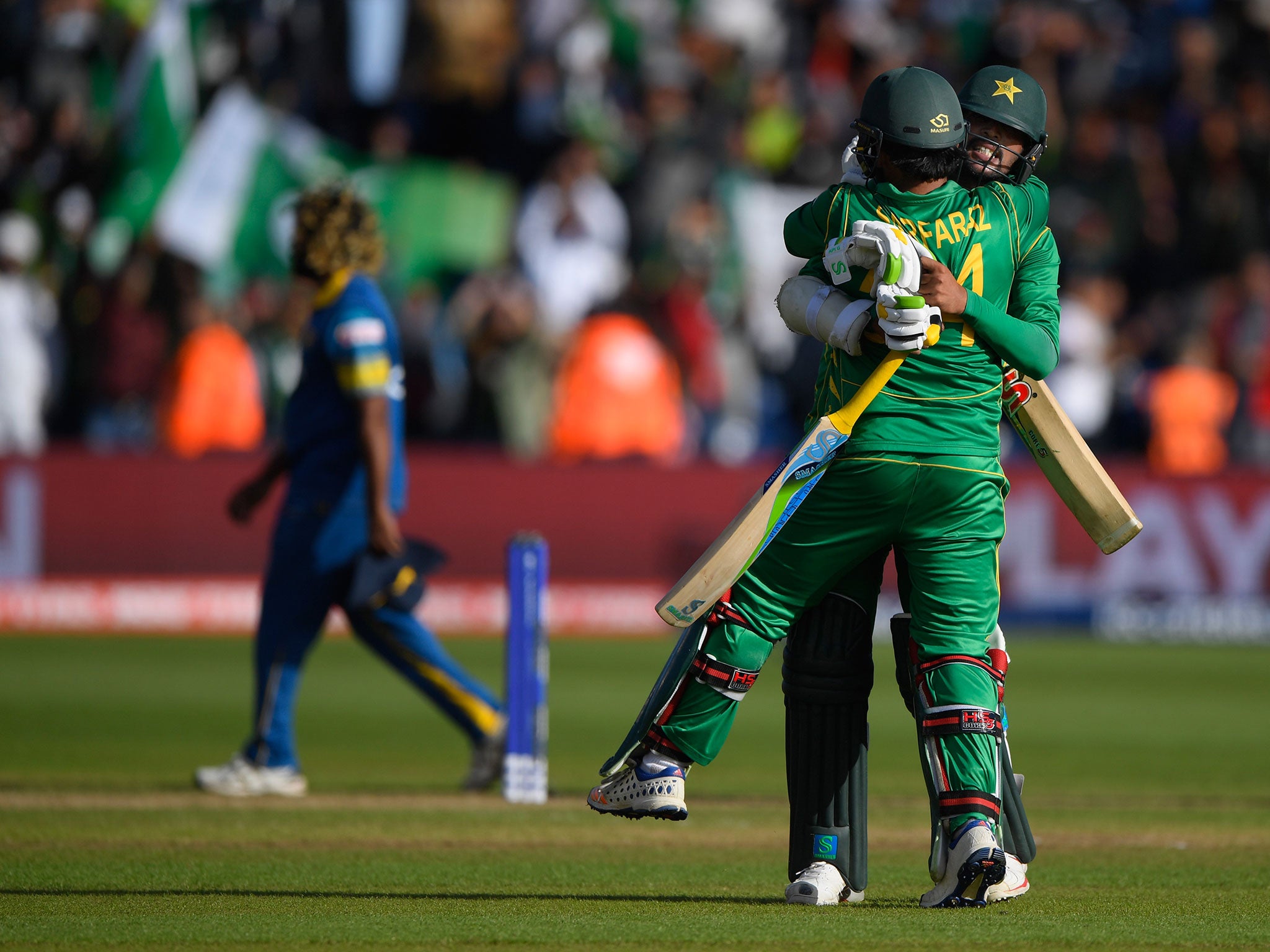 Sarfraz Ahmed and Mohammad Amir celebrate after securing victory