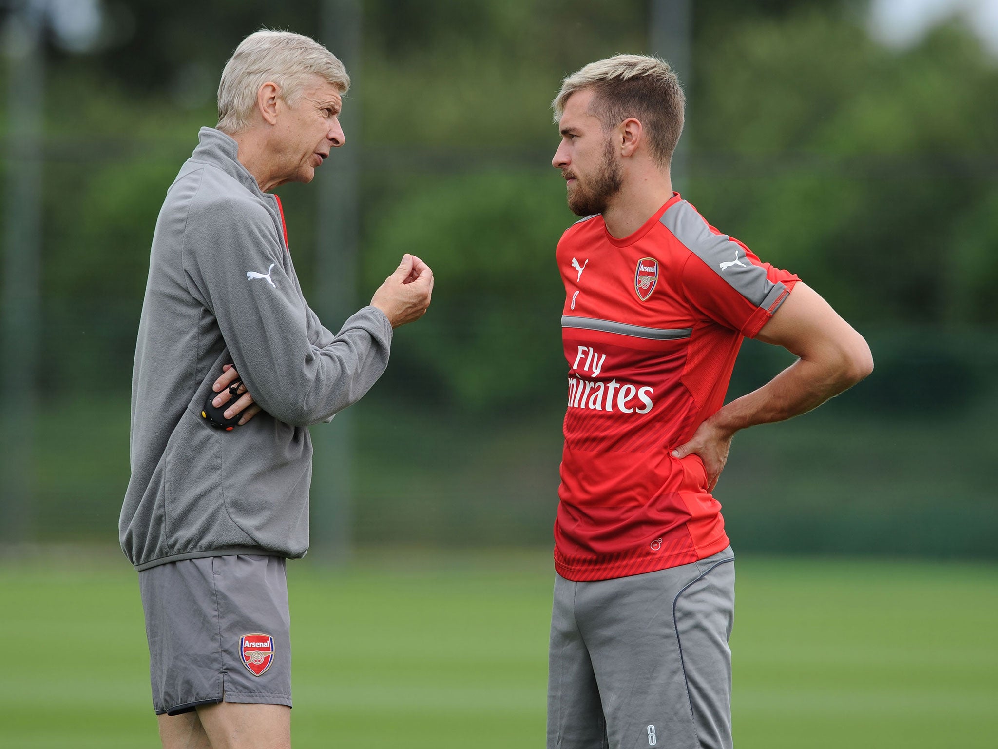 Aaron Ramsey and Arsene Wenger in training together