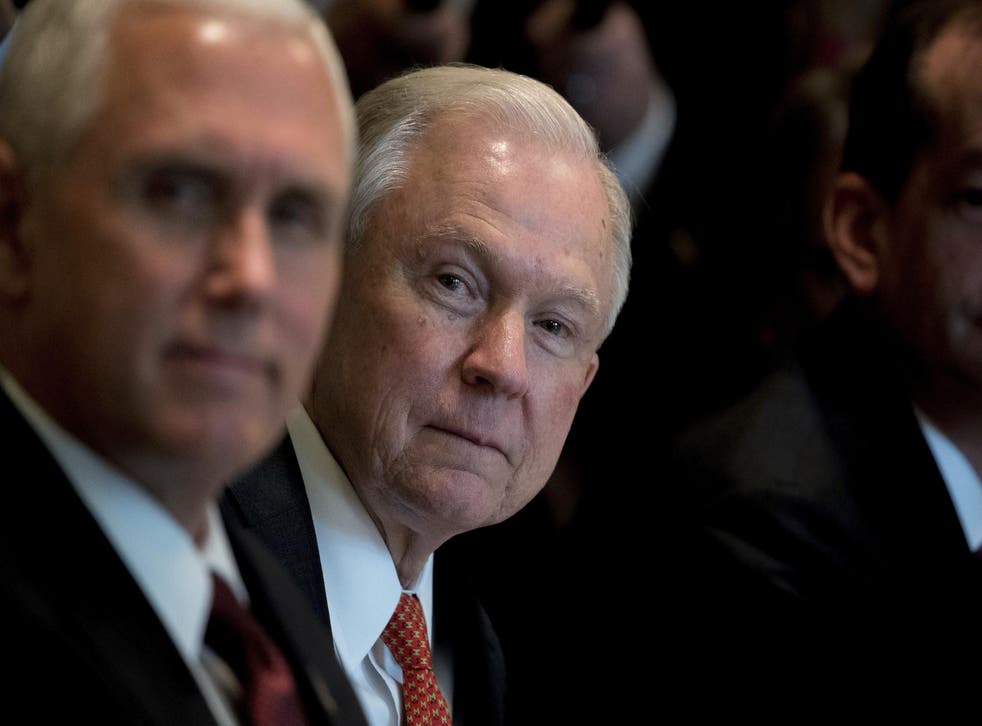 Attorney General Jeff Sessions and Vice President Mike Pence attend a Cabinet meeting