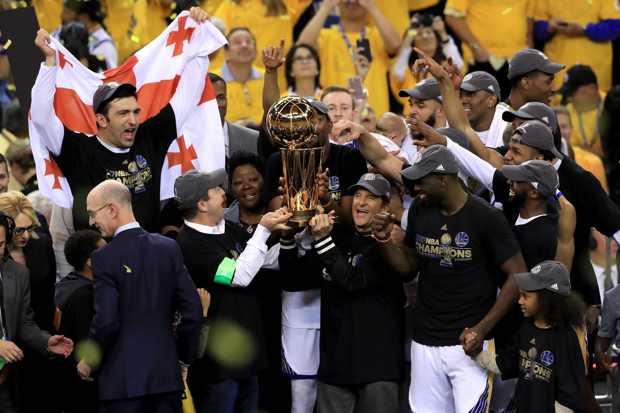 The Warriors lift the Larry O'Brien trophy after beating the Cavaliers