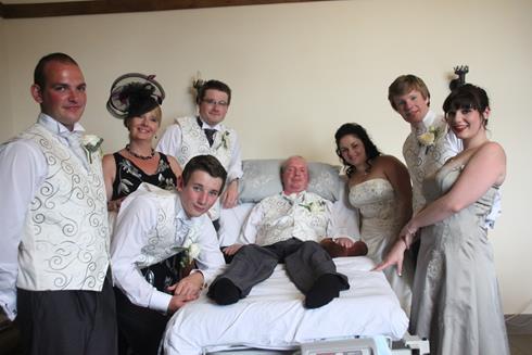Rob Johnson, pictured on his son’s wedding day, only has movement in his eyes