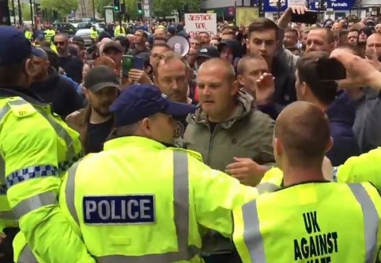 Far-right protesters clashed with police and counter-demonstrators in Manchester on Sunday