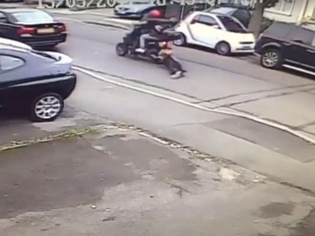 The woman refused to let go of her bag and was dragged along the street by the moped
