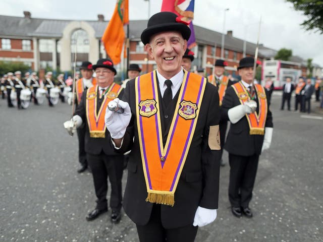 Orangemen lead the main 12th July parade to mark the anniversary of King William III's victory at the Battle of the Boyne in 1690