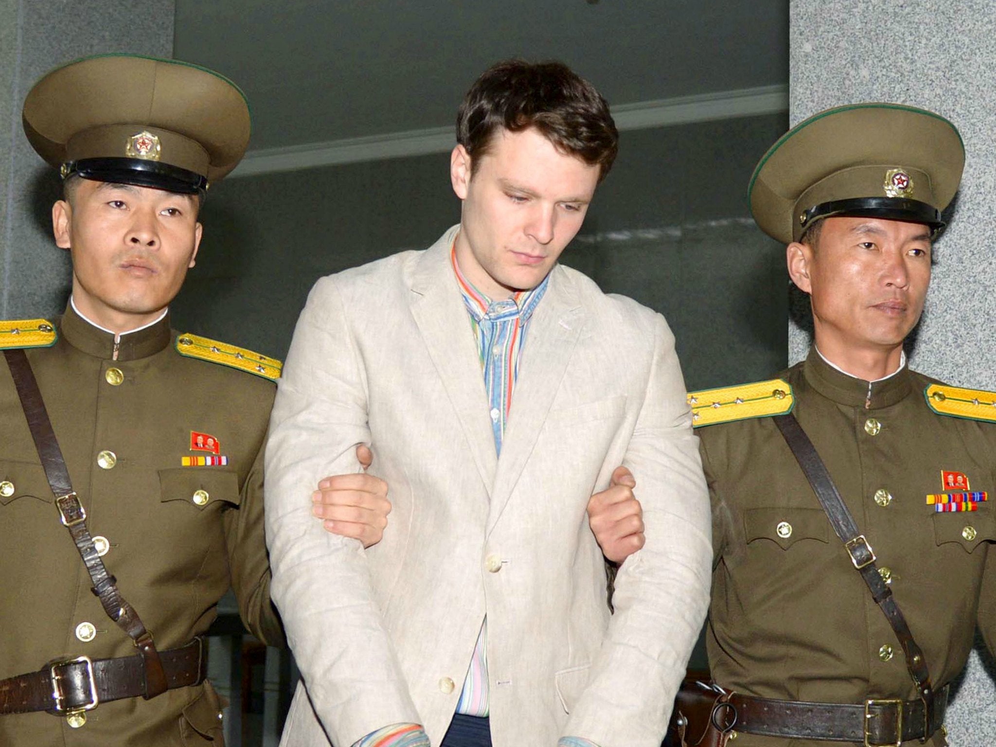 Otto Frederick Warmbier is taken to North Korea's top court in Pyongyang