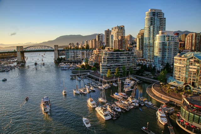 Canada offers the chance for immigrants to have a positive economic impact and contribute to a thriving society in cities like Vancouver (pictured). 