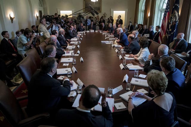 Donald Trump laps up the praise during meeting of his cabinet on Monday