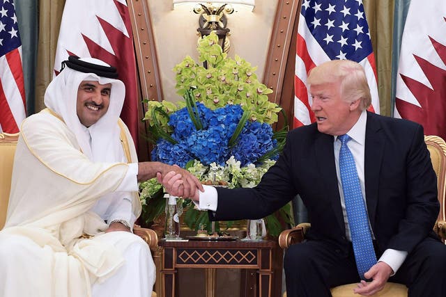 Crunchtime: Mr Trump with Qatar’s emir Tamim bin Hamad Al-Thani in Riyadh in May