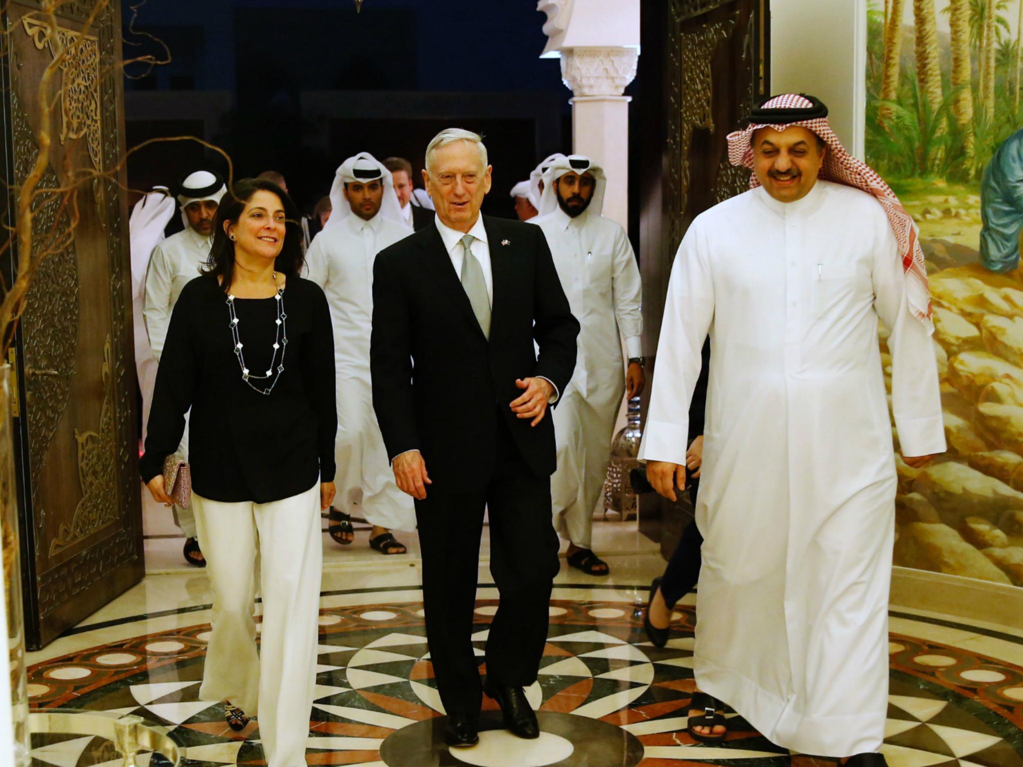 Qatar Minister of State for Defence Affairs Khalid bin Mohammed al-Attiyah meets with US Defence Secretary James Mattis and US ambassador to Qatar Dana Shell Smith at his residence in Doha on 22 April