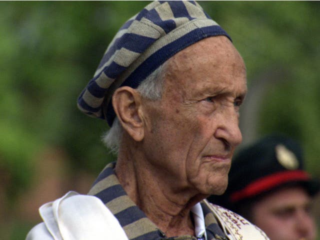 Holocaust survivor Ed Mosberg who is part of the new documentary 'Destination Unknown' wearing the Tallit in Birkenau