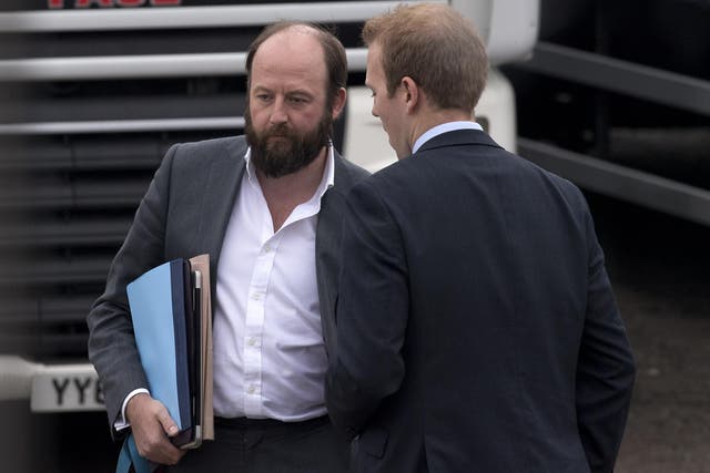 Nick Timothy (left) speaks with a Tory party worker during the election campaign