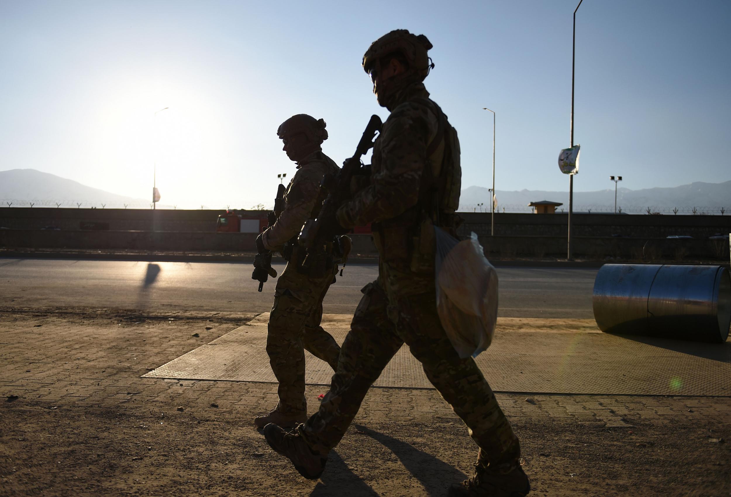 US soldiers arrive at the site of a suicide car bombing in Afghanistan