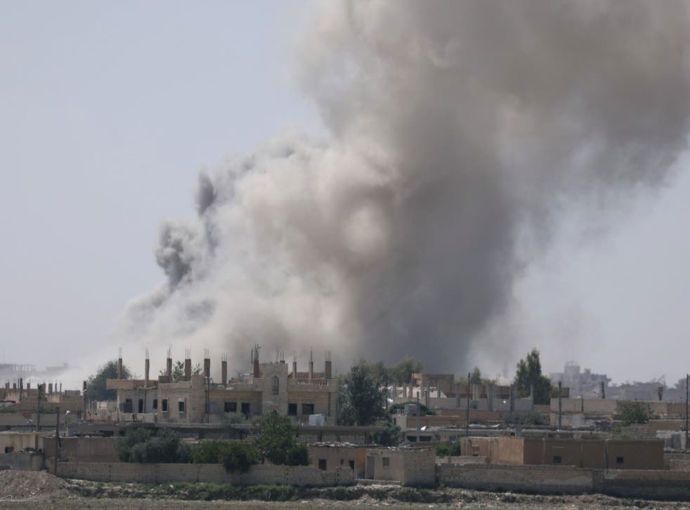 Smoke rises from the al-Mishlab district at Raqqa’s southeastern outskirts on 7 June