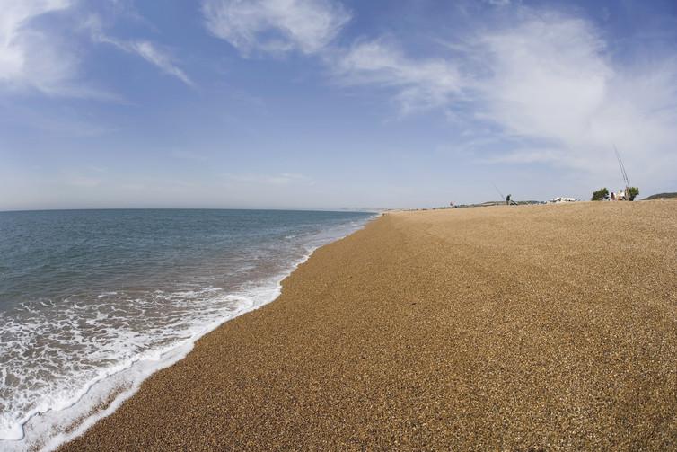 Chesil Beach is 29km long, 200m wide and as high as 15m in places